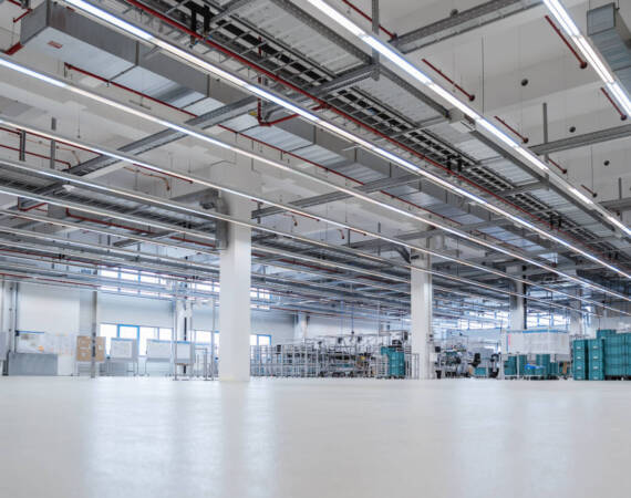 Illuminated warehouse of modern factory, Stuttgart, Germany